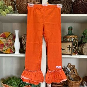 Ruffle girl pants orange size 12